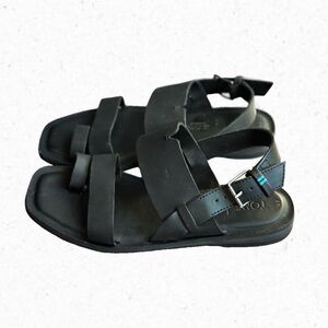 Black leather Toms sandals